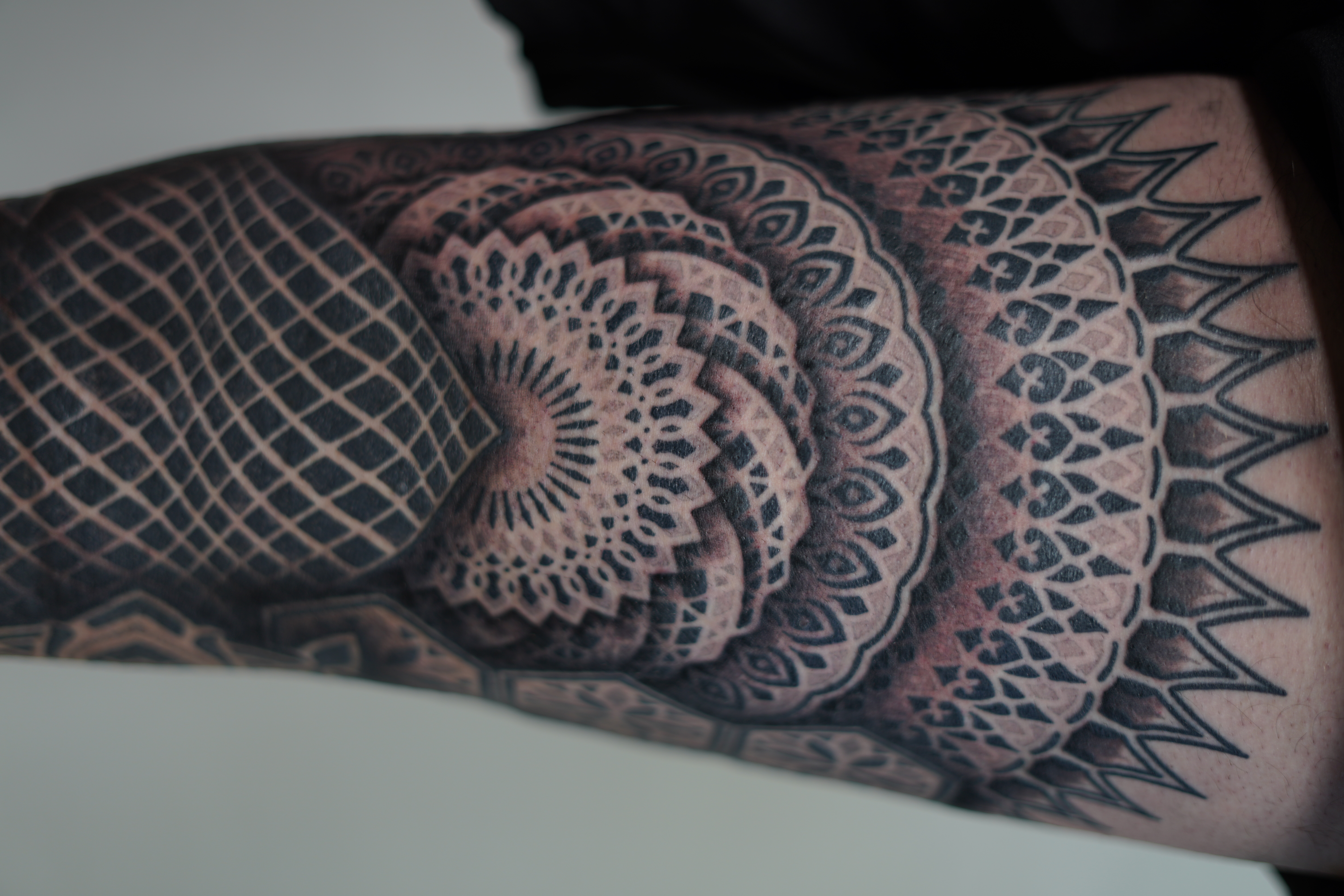 Dotwork mandala forearm tattoo by Steve Sherick