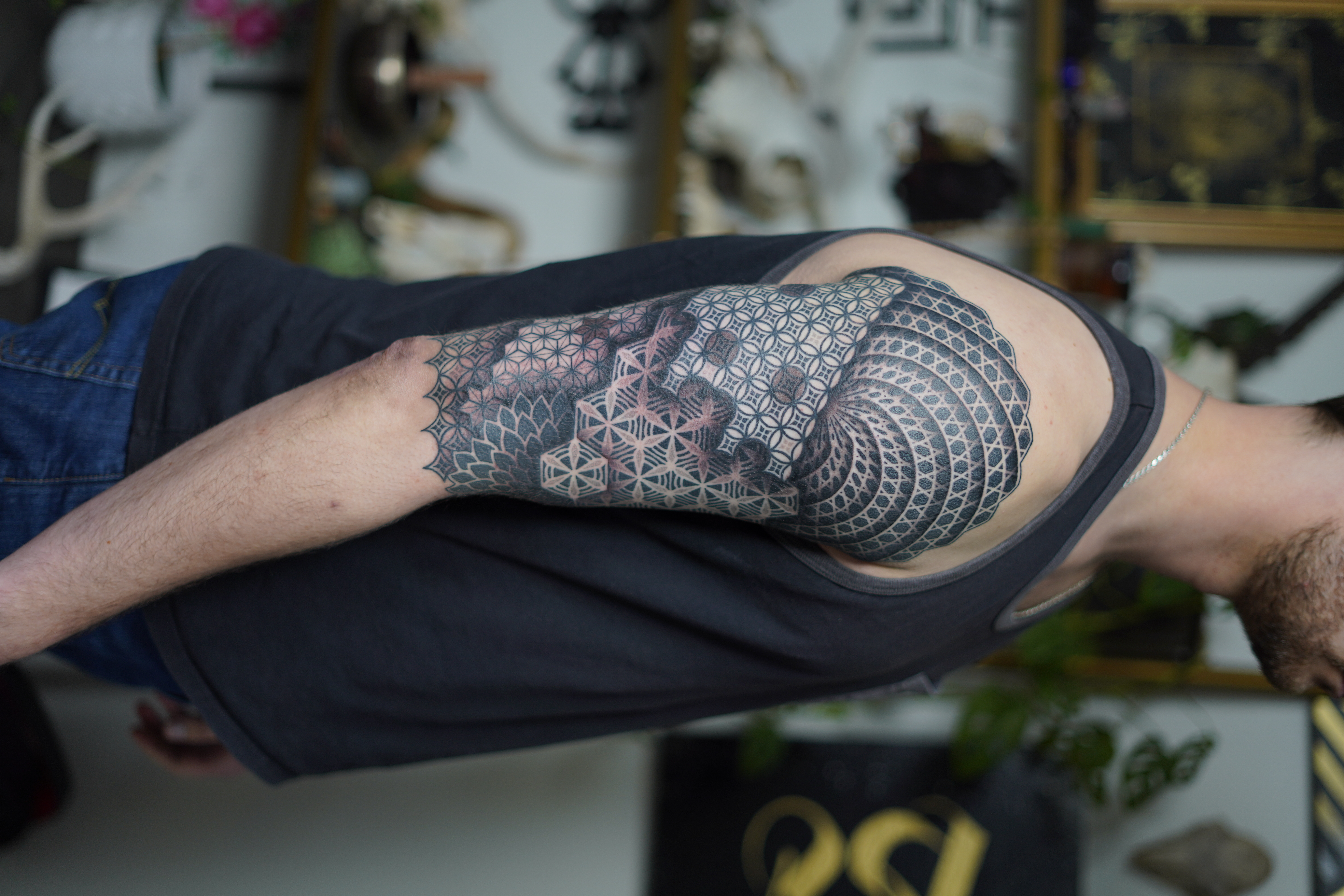 Sacred geometry elbow wrap tattoo by Steve Sherick