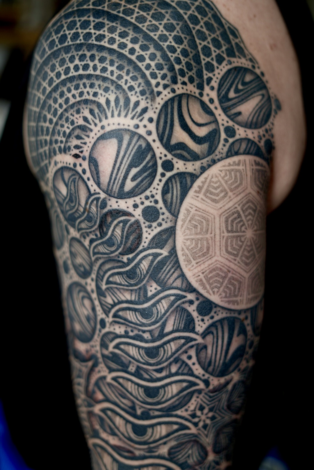 Dotwork shoulder cap — cosmic sleeve by Steve Sherick