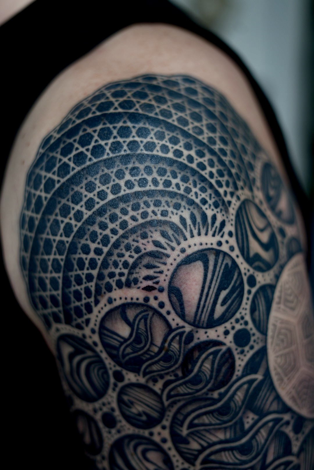 Cosmic shoulder cap dotwork and sacred geometry close-up by Steve Sherick