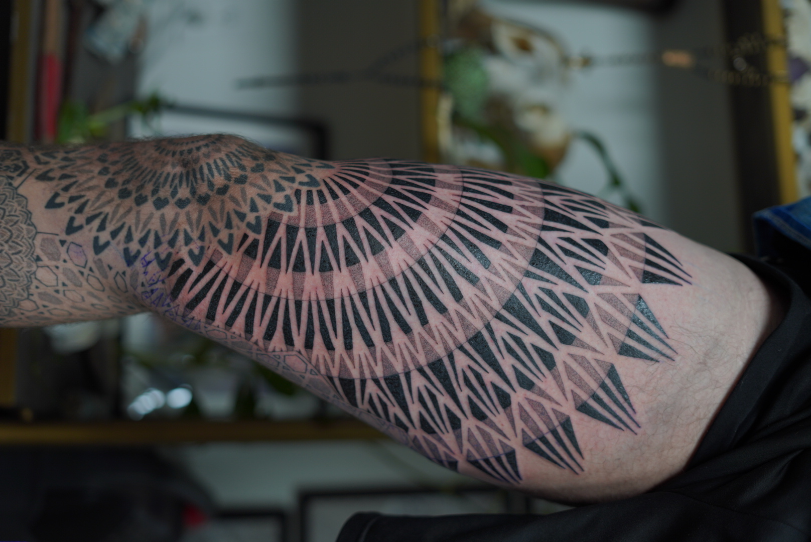 Geometric neo tribal radiating elbow cap tattoo by Steve Sherick