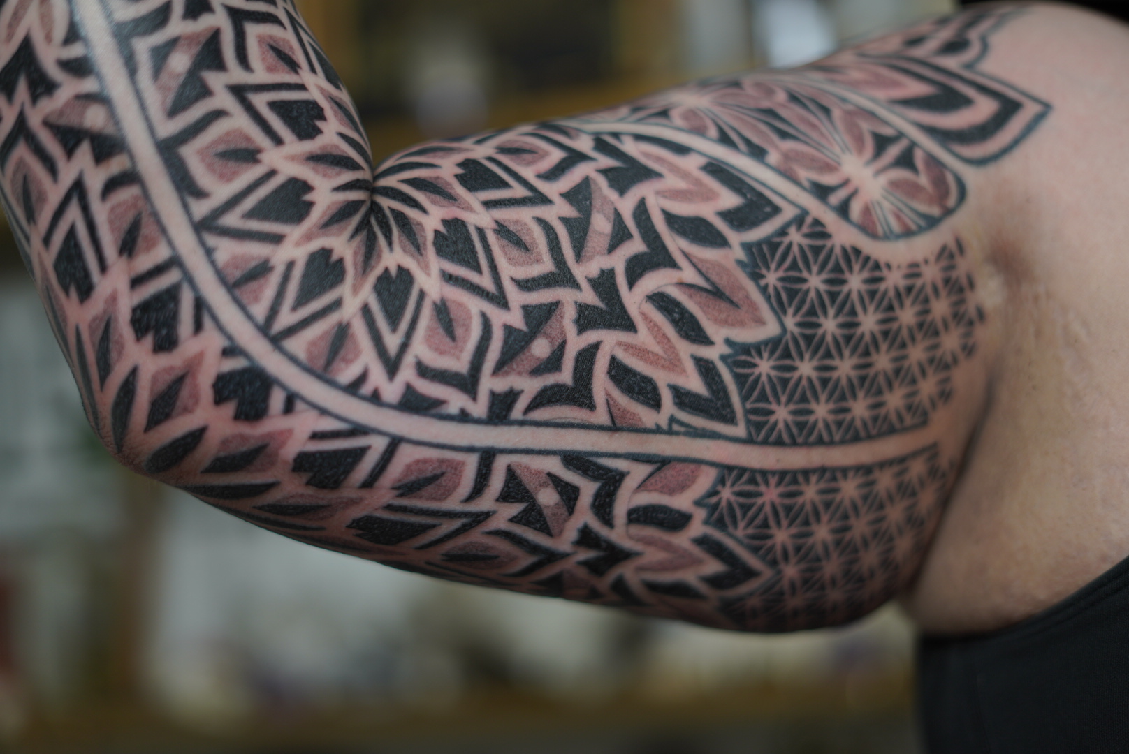 Neo tribal blackwork sleeve with flower of life by Steve Sherick