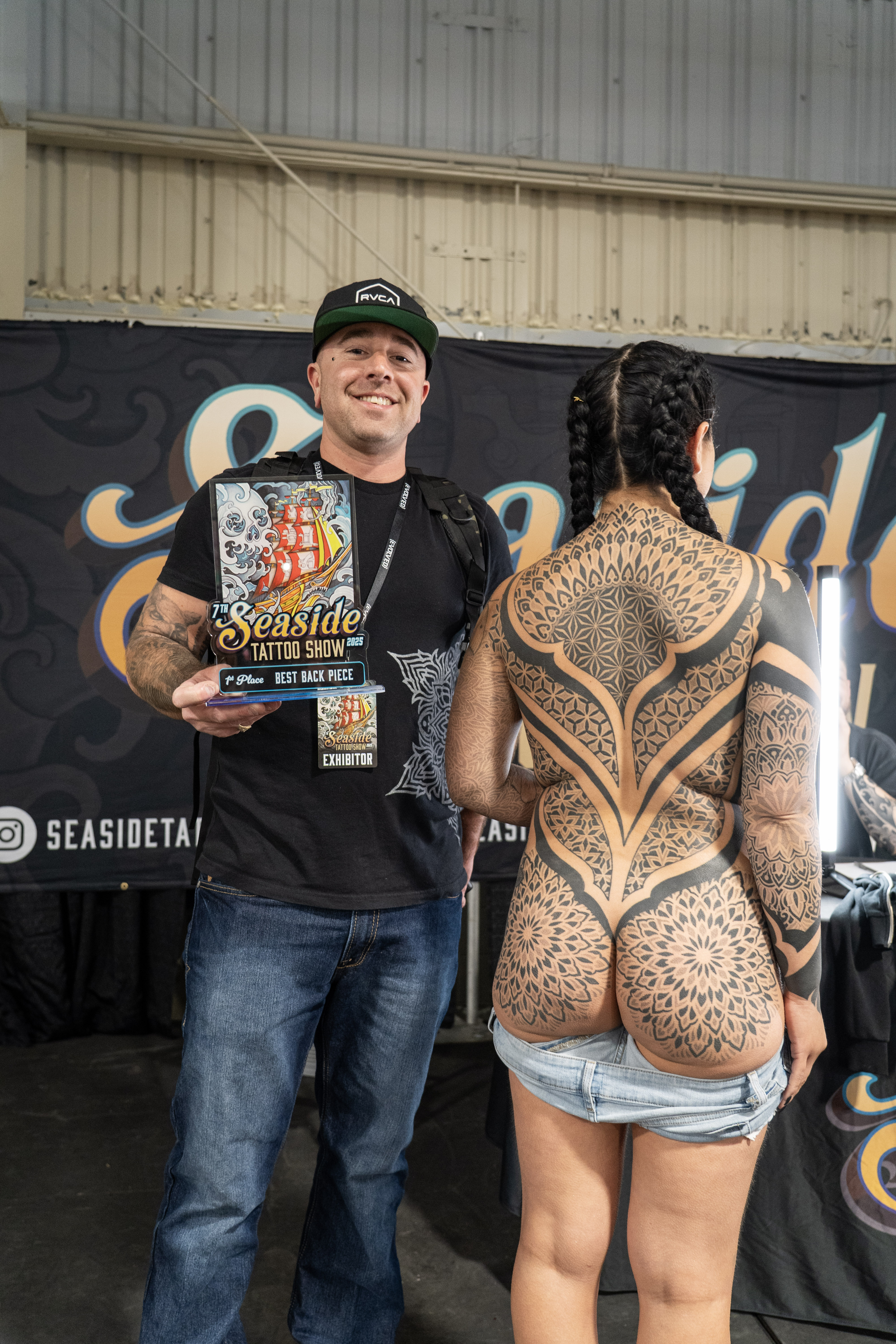 Steve Sherick with 1st Place Best Back Piece trophy at the 7th Seaside Tattoo Show 2025